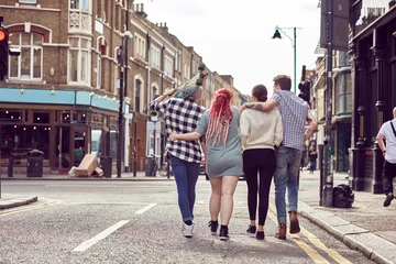 Foto op Plexiglas Teenage friends walking together © Image Source