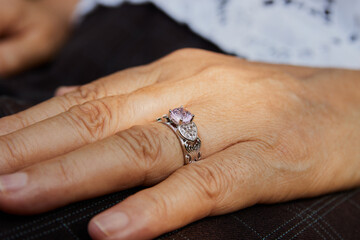 Zoom View Woman's Hand with Pink Diamond Wedding Ring