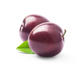 Pair of purple Plums with leaf isolated on white background.