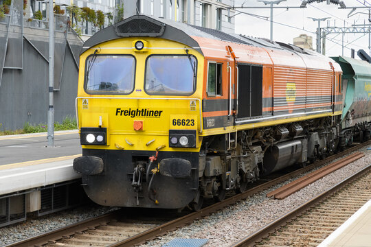 London, UK - July 28, 2023; Class 66 Freightliner hauled freight train providing UK freight services
