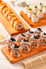 sushi is a Japanese dish of prepared vinegared rice, usually with some sugar and salt, accompanied by a variety of ingredients such as seafood, often raw and vegetables.