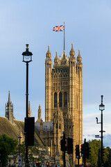 Victoria Tower at the Palace of Westminster with Union Jack flag in London