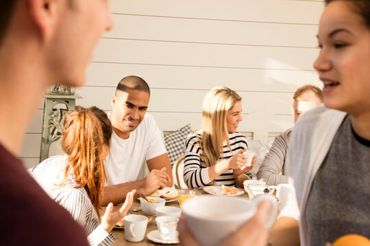 Friends eating breakfast together