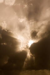 Sun rays behind clouds