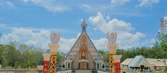 air upas - august 9, 2023 : the beauty of the Catholic Cathedral Church located in Air Upas Village, Air Upas District, Ketapang Regency, West Kalimantan, Indonesia - obrazy, fototapety, plakaty