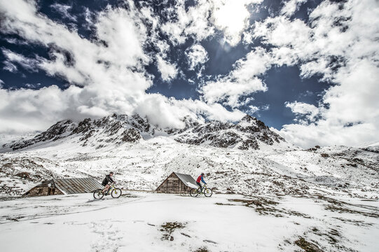 Cyclists on Col du Galibier in Dauphine Alps, France
