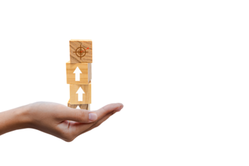 Place a wooden block in your hand as a step toward your goal. Business ideas for a successful growth process.PNG