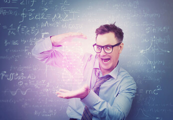 A conceptual portrait of a scientist holding a shining crystal lattice between his hands, on a dark...