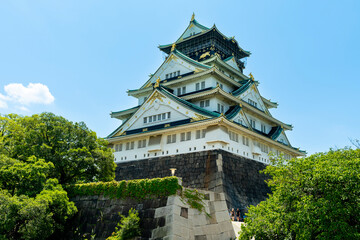 Fototapeta na wymiar Osaka castle and fortess with clair sky. Osaka castle is Japanese ancient castle is landmark in Osaka,Kansai,Japan,