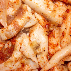 Salted salo with garlic and red pepper.Salo pickled with spices.