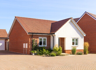 New build modern detached bungalow with block paved driveway. UK
