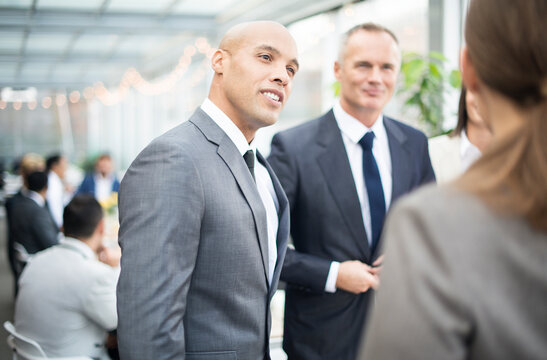 Businessman with note pad during meeting at restaurant