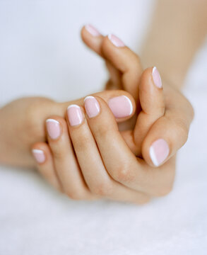 Woman's hands with French manicure