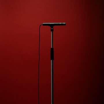 Microphone on red background