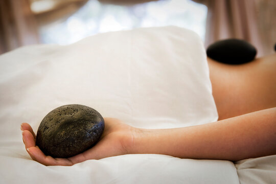 Woman receiving lastone therapy
