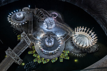 Circular buildings on lake in Salina Turda