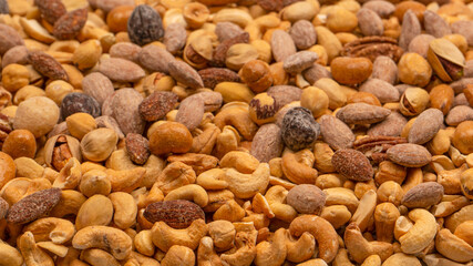 A group of almonds, pistachios, walnuts, macadamia, cashews.