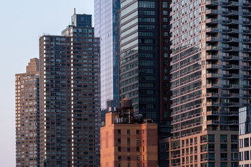 Fototapeta na wymiar Illuminated New York Corporate Skyline at Sunset