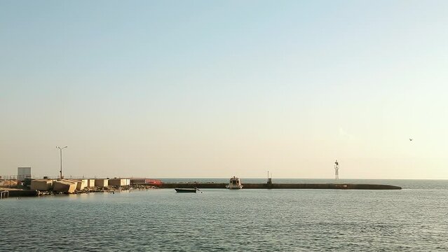 Panorama from the sea to the pier and the beach.