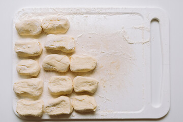 lazy dumplings on cutting board