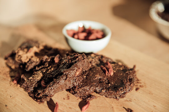 Raw date and pecan slice with goji berries