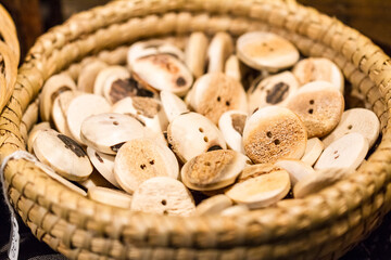 Basket of wooden buttons