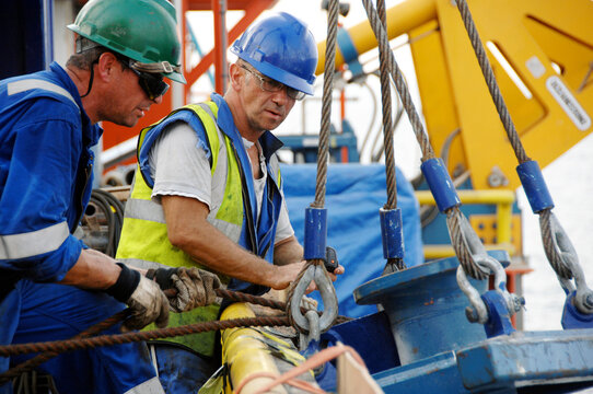 Close up of oil rig workers