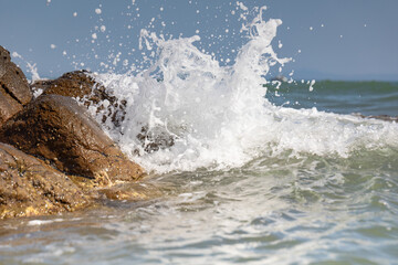Sea waves crashing on rocks/reefs