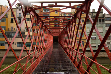 Fototapeta premium The red iron bridge in Girona, in Spain.