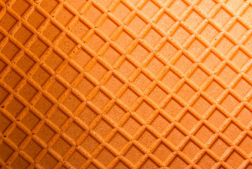 Spelt waffle with a grid pattern as background