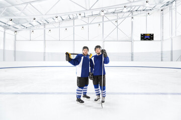 Ice hockey players in blue uniforms