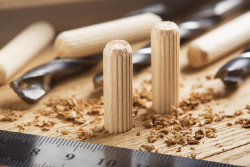 hole in wooden oak board for wooden dowel. carpentry industry.