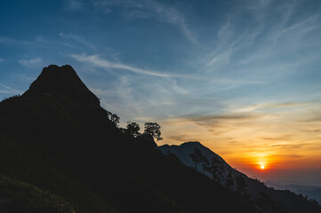 Beautiful Sunrise on khao khao chang phueak mountian.Thong Pha Phum National Park's highest mountain is known as Khao Chang Phueak