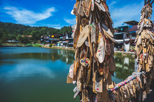 Kanchanaburi.thailand 19.12.2022 Prayer tags tied to a  on the bridge in the etong village in kanchanaburi City Thailand.Pilok mine The Old mine near the Thai-Myanmar border