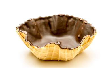 Empty wafer bowl lined with chocolate for desserts