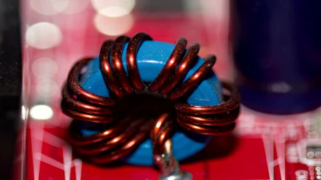 Close up of inductor copper coil on circuit board