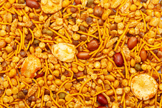 Close-up of Rich and Spicy Navratan Indian namkeen (snacks) Full-Frame Background. Top View.