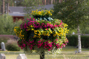 impressive floral decoration with various colorful flowers in the shape of a ball