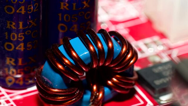 Close up of inductor copper coil on circuit board
