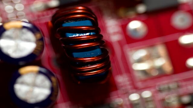 Close up of inductor copper coil on circuit board