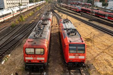 Two electric locomotives. Frankfurt Germany - July 19, 2023: Train locomotives on the siding....