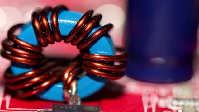 Close up of inductor copper coil on circuit board
