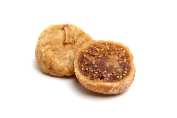 Dried figs isolated on white background. Healthy snacks dried fruit. Whole and halved fig with seeds