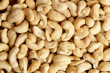 Cashew nut heap food texture background. Healthy nut snack, top view