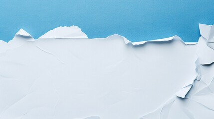 Obraz premium Pieces of crumpled torn white paper on a blue background