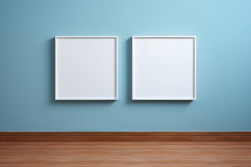 Two empty blank frames on a blue wall