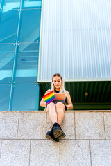 LGTBI College Girl. Modern girl tattooed with the pride flag between her legs.
