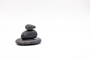 A black cairn cut out on white background