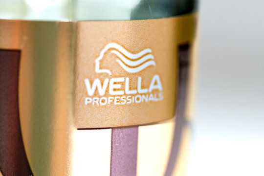 London. UK- 08.04.2023. Close up of the Wella company brand logo on one of its hair products.