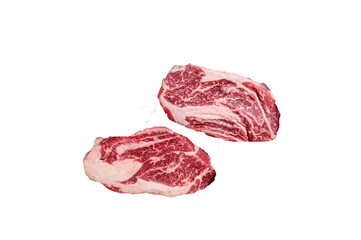 Uncooked Raw chuck eye roll steaks in a steel kitchen tray. High quality Isolate, transparent 